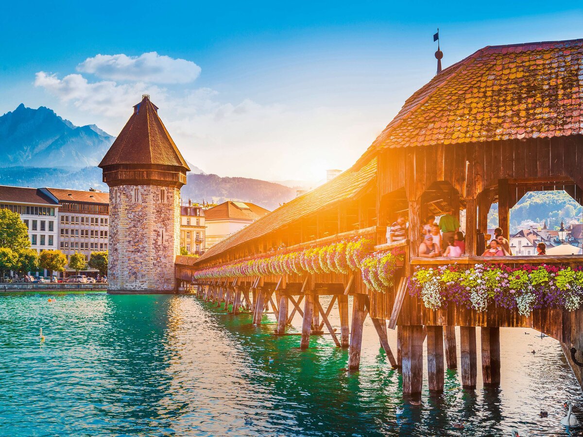 Famous Chapel Bridge and Mount Pilatus summit
